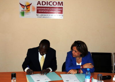 MoU signing between We-Empower Country Representative Mr. Alassane Aguili, also President of a local NGO, ADICOM, and We-Empower President, Mrs. Noubia Gribi