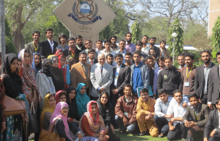 Fig 5. Veterinary students with Dr. Memon (center in white jacket) and Dr. Zafar Iqbal (in brown jacket next to Dr Memon), Dean, Faculty of Veterinary Medicine, University of Agriculture, Faisalabad, Pakistan